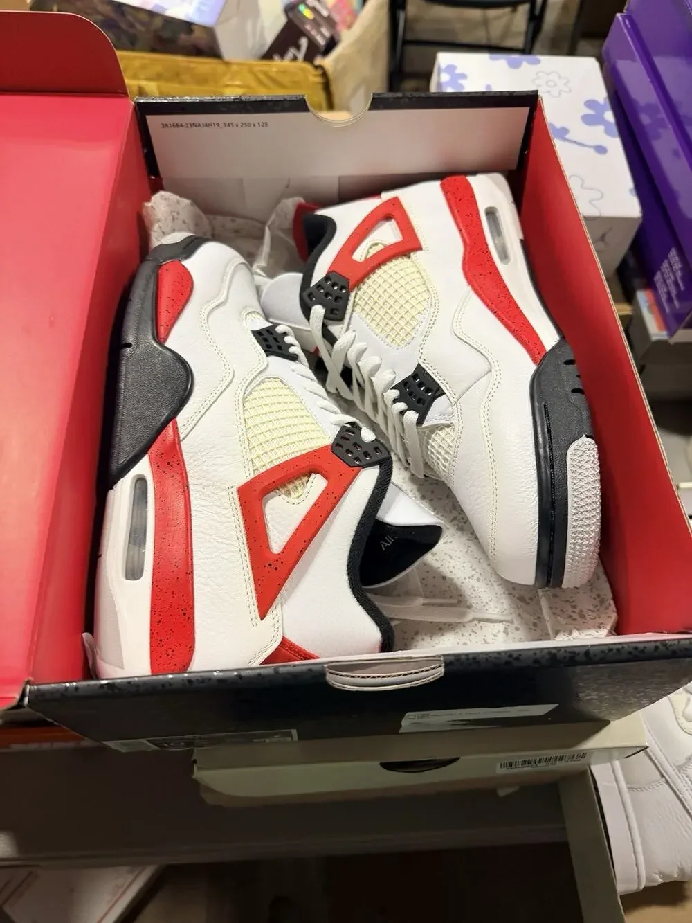 Size 10 - Jordan 4 Retro Mid Red Cement